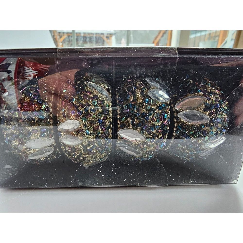New 4 piece Napkin ring holders in gold and black beads